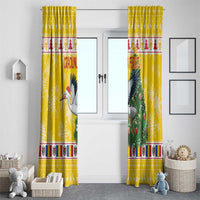 Yellow window curtain pair featuring stork and Christmas tree graphic with border accents