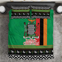 Green Christmas bedding set with central flag panel, figures, and black-white zigzag border