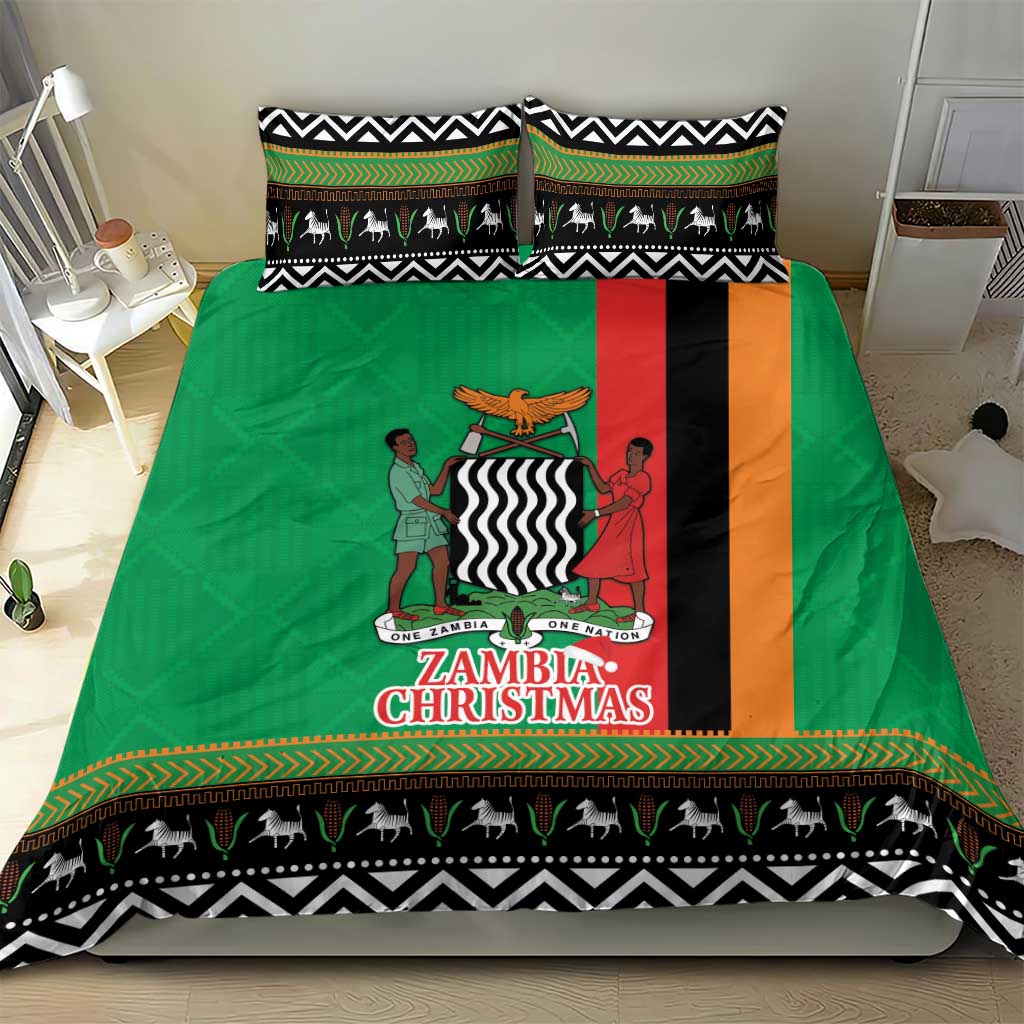 Green Christmas bedding set with Kente-style border, animal silhouettes, and central print panel