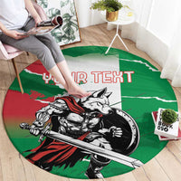 Green round rug with wolf warrior grunge graphic and 'YOUR TEXT' in red at center.