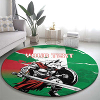 Green round area rug featuring wolf warrior grunge print with red 'YOUR TEXT' lettering.