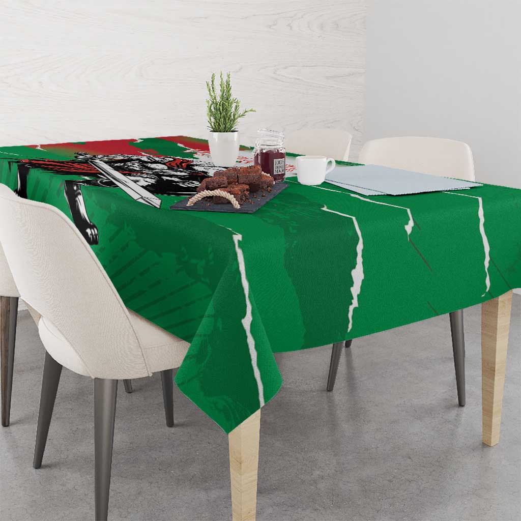 Green tablecloth showing wolf warrior grunge artwork with table edge overhang.