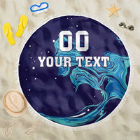 Round navy beach blanket with white fringe, custom text and blue wave flame pattern