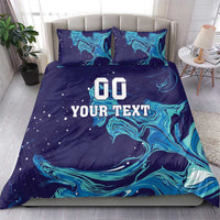Custom rugby bedding set with dark blue and teal flame swirl print; two pillowcases show 'YOUR TEXT'.