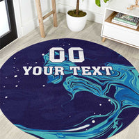 Custom round rug with navy base, teal wave pattern, and bold customizable text