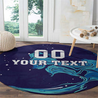 Round custom rug with navy background, teal wave art, and large 'YOUR TEXT'