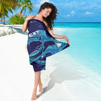 Blue sarong with aqua flame-wave print, gathered knot at side, custom text panel