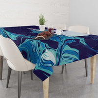 Custom rugby tablecloth with teal flame-like swirl pattern over a dining table and chairs
