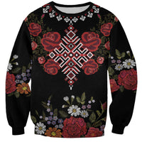 Black unisex sweatshirt with red floral and geometric embroidery pattern, crew neck