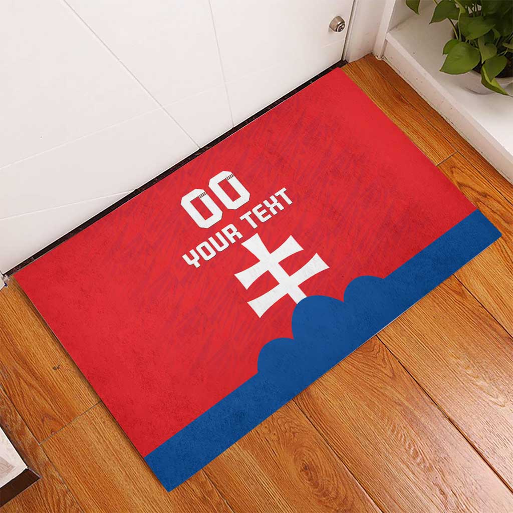 Red custom football rubber doormat with white number, text, and blue stripe border