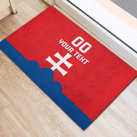 Red custom football rubber doormat with white emblem, text, and blue horizontal band