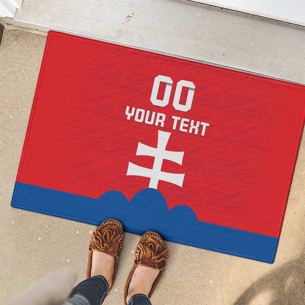 Red custom football rubber doormat with white number, text, and blue stripe