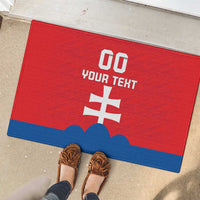 Red custom football rubber doormat with white number, text, and blue stripe