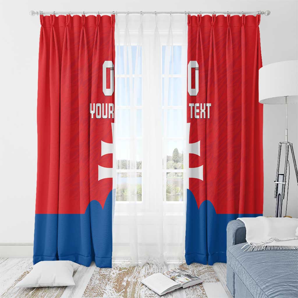 Red and blue flag-style curtains with white cross and custom text, hung on a rod.