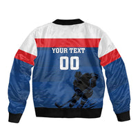 Blue zip bomber jacket with bold 'YOUR TEXT 00' back print and hockey player graphic.