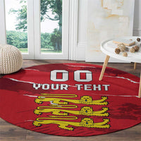 Red round sporty carpet rug with custom text and yellow cartoon lions, on wooden floor