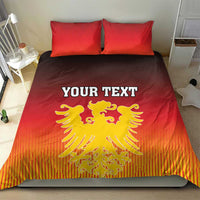 Red duvet with “YOUR TEXT” and yellow coat of arms emblem, plus matching red pillows