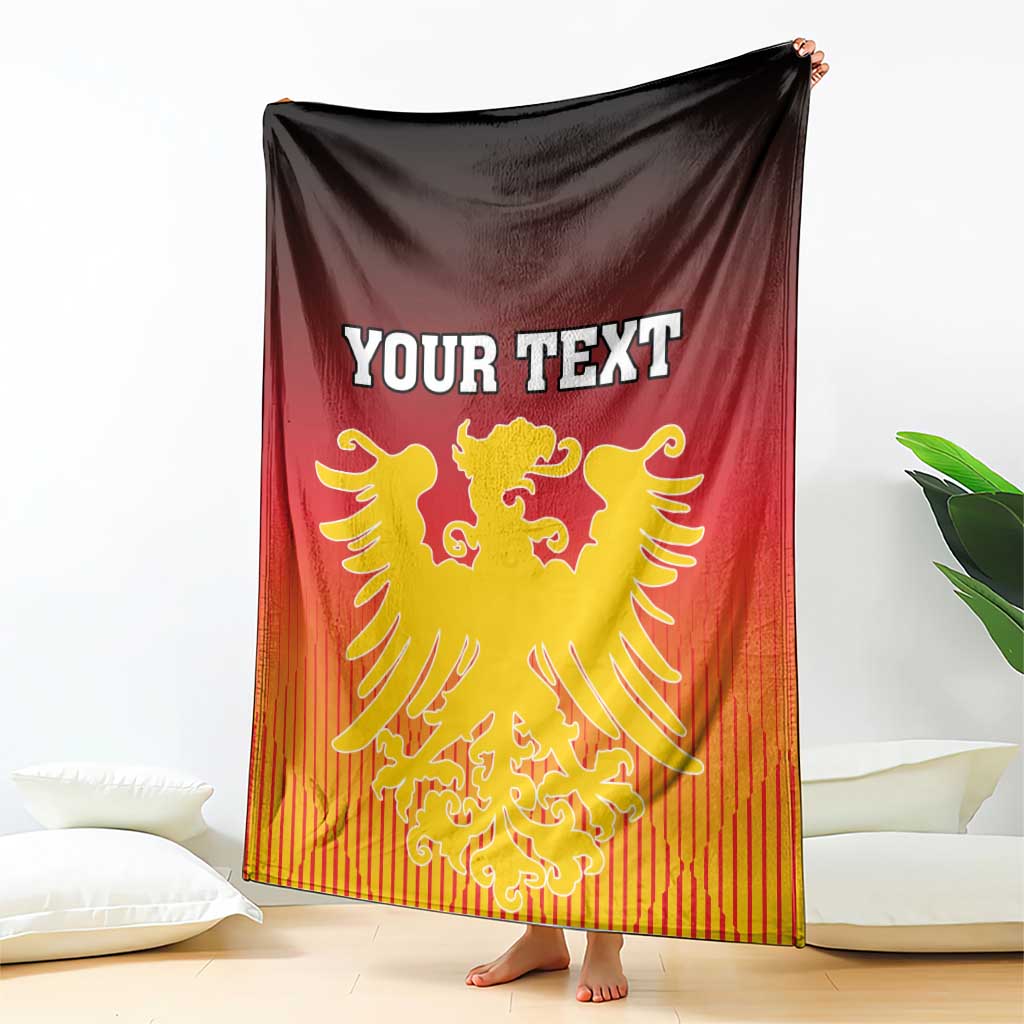 Personalized Germany blanket draped on sofa, YOUR TEXT with gold lion crest