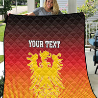 Personalized quilt with German coat of arms, red-to-orange gradient, black border, diamond quilting