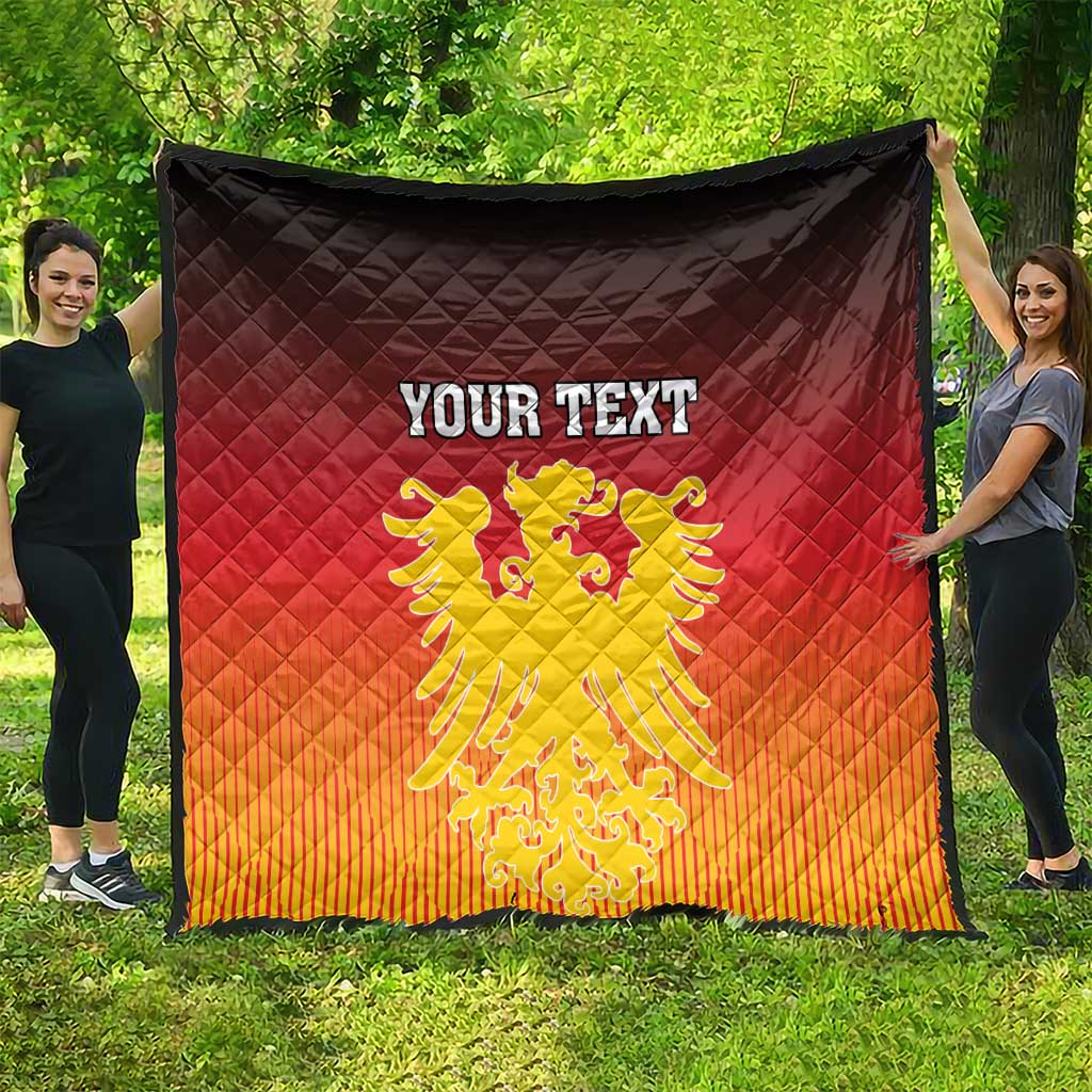 Personalized quilt featuring German coat of arms, red and orange gradient, black border, quilted diamonds