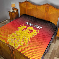 Personalized quilt on a bed, German coat of arms graphic, red-orange gradient, black border, quilted