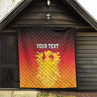 Personalized quilt with German coat of arms, red center fading to orange, black trim, diamond stitching