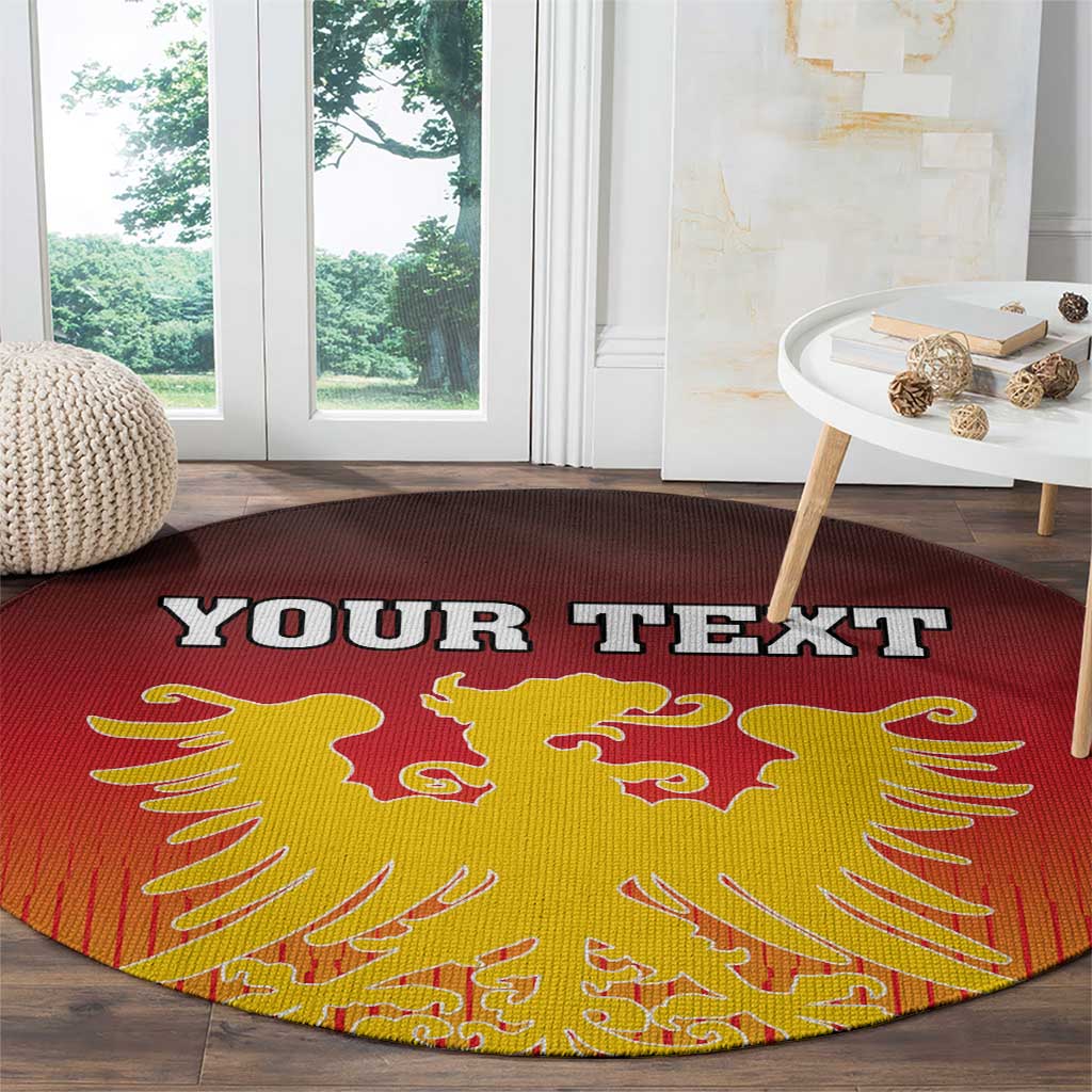 Round red carpet with gold Germany coat of arms and custom text, angled view