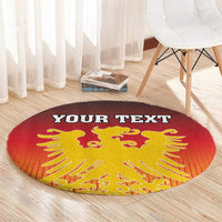 Round red carpet with gold Germany coat of arms and custom text, edge visible