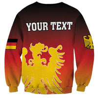 Unisex crewneck sweatshirt in red with YOUR TEXT back print and double-eagle design