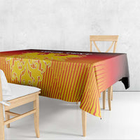 Red and gold striped tablecloth with centered coat of arms motif