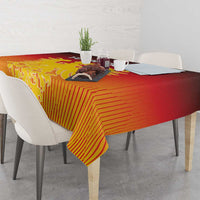 Red and gold striped tablecloth with coat of arms, draped over dining table
