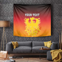 Red wall tapestry with gold eagle coat of arms crest and 'YOUR TEXT' on display