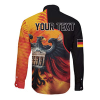 Black long sleeve button shirt with yellow-red back print, eagle image, and 'YOUR TEXT'