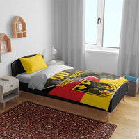 Germany 1990 bedding set on bed frame with camo flag duvet, crest emblem, and yellow pillows
