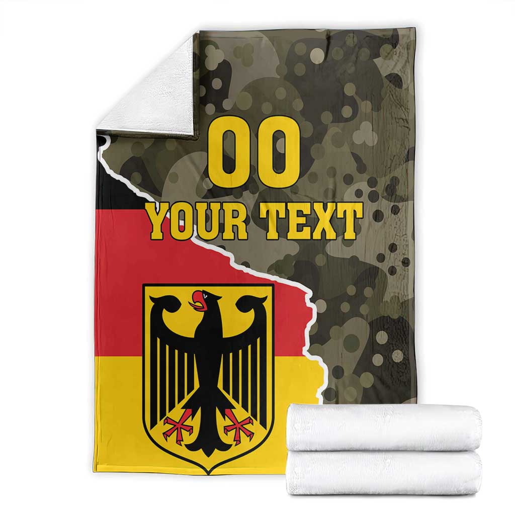 Folded green camo Germany blanket with red stripe and coat of arms, “00 YOUR TEXT”