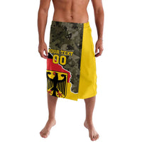 Germany 1990 lavalava wrap skirt with camo panel, red and yellow crest print