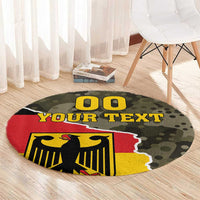 Round camouflage carpet with eagle crest, 'YOUR TEXT' lettering, and red-yellow shield panel