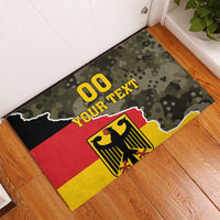 Custom rubber doormat featuring Germany flag colors and black eagle crest on camo