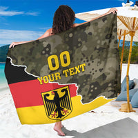 Germany sarong coat with camouflage print, eagle crest, and bold “00 YOUR TEXT” design