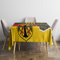 Rectangular dining tablecloth featuring yellow background and coat-of-arms with camouflage panel