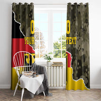 Germany-themed camo curtains with coat of arms print and yellow text, paired for wide window
