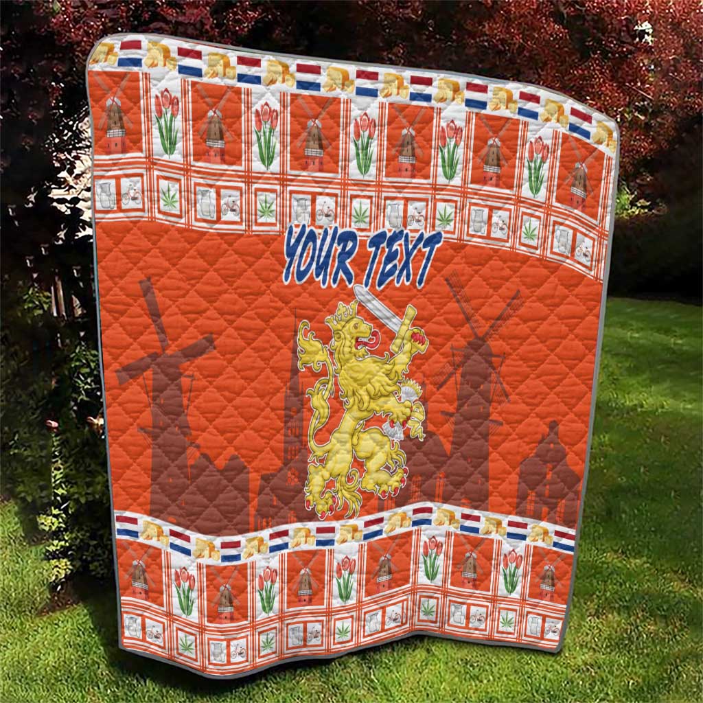 Orange personalized quilt blanket with 'YOUR TEXT' and Netherlands coat of arms, quilted diamonds