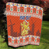 Orange personalized quilt blanket with 'YOUR TEXT' and Netherlands coat of arms, quilted diamonds