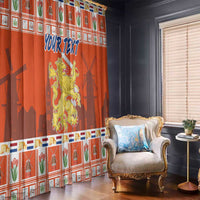 Orange window curtain with Dutch crest and blue “YOUR TEXT” print, festive border