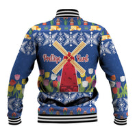 Blue baseball jacket back view with windmill, tulip and snowflake graphics; striped hem cuffs.