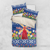 Blue Christmas bedding set with tulip flowers and windmill graphic; includes two pillowcases