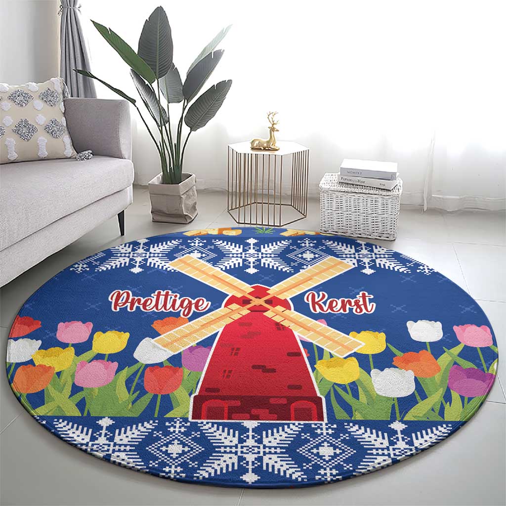 Blue round Christmas rug with windmill center, tulip blooms and snowflake pattern, “Prettige Kerst”