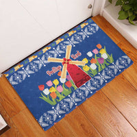 Blue Christmas rubber doormat with central windmill and tulip flower design