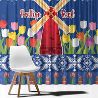 Blue Christmas curtain fabric detail with tulip flowers, windmill sign, and snowflake border