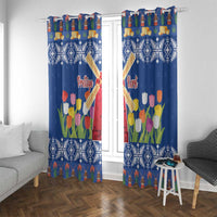 Blue Christmas window curtain panels with tulip flowers, windmills, and snowflake accents